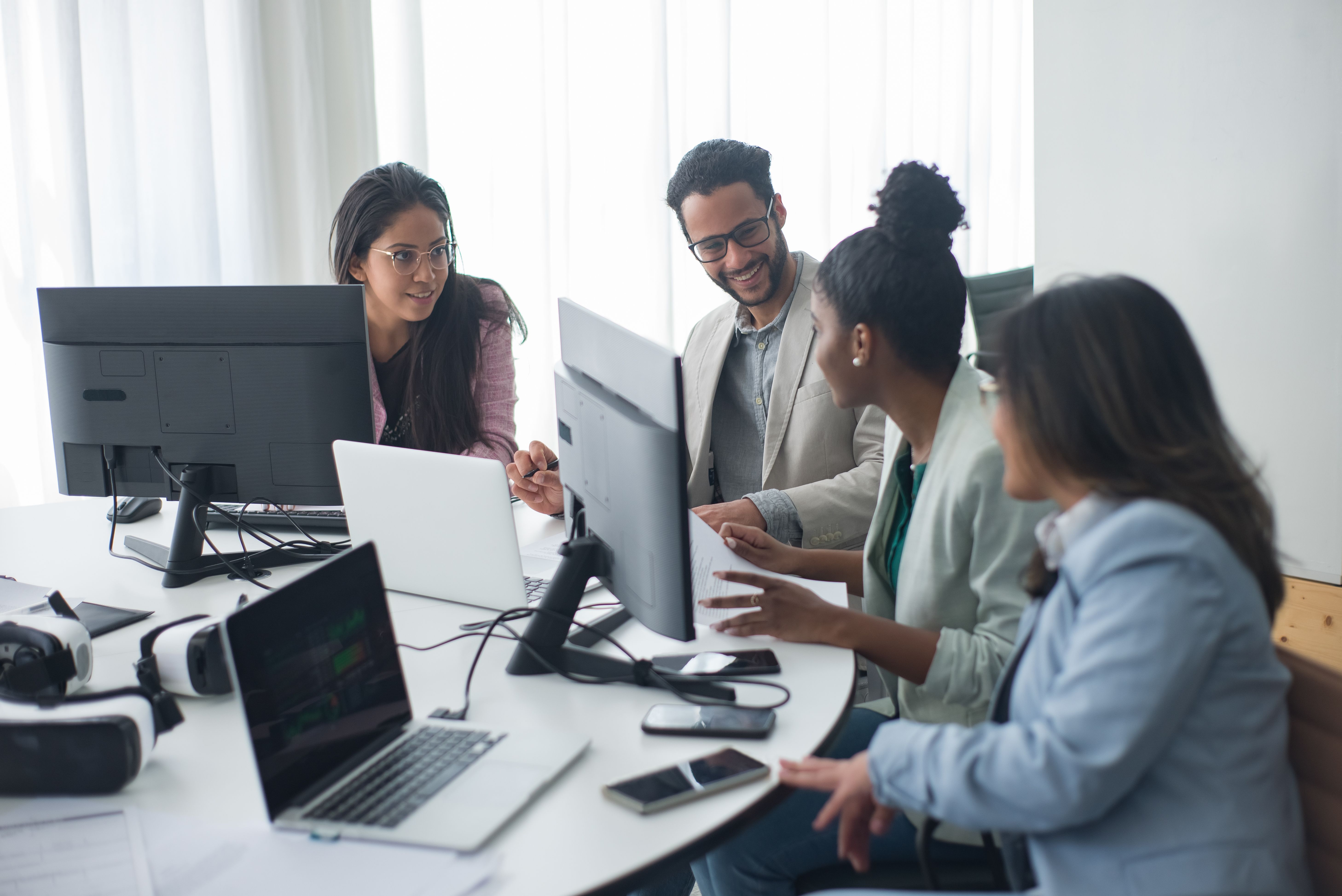 IT professionals collaborating as a technology team